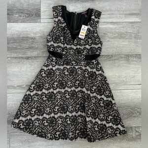Size medium beautiful lace dress with cutouts new with tags